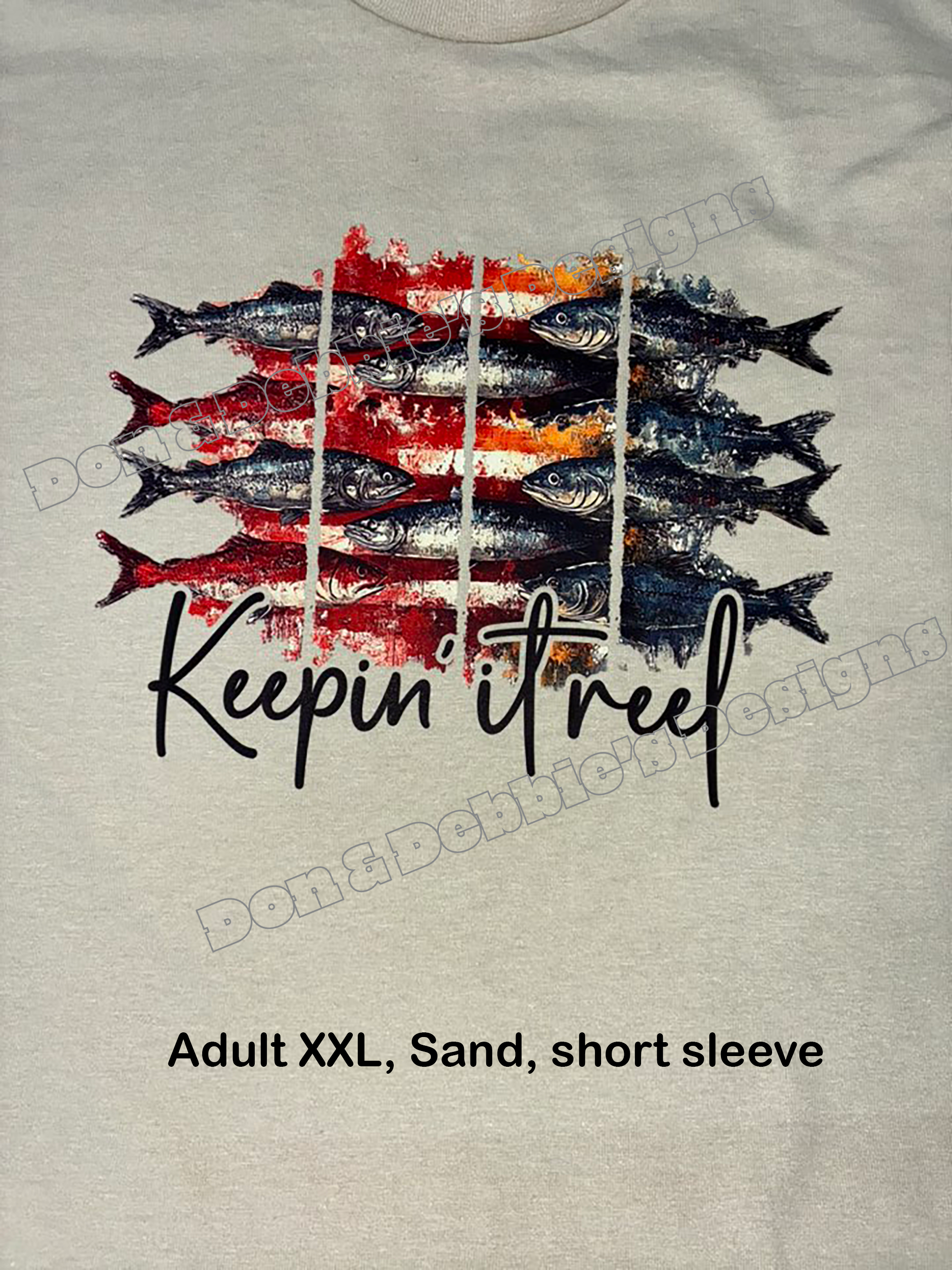Keepin’ It Reel Flag Tee – Unisex Gildan in Sand (XXL) 🎣