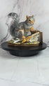 porcelain squirrel figurine with acorns