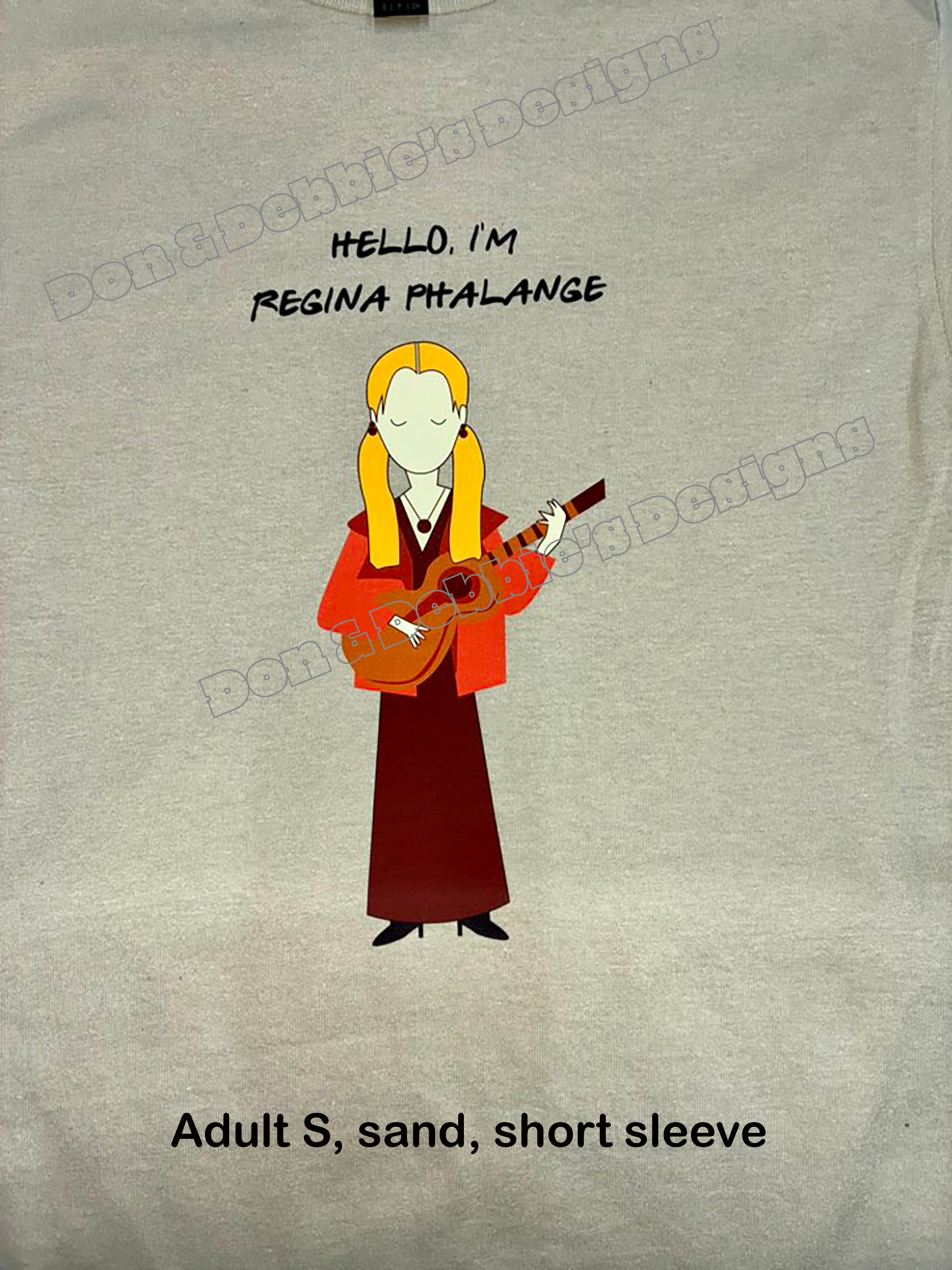 🎸 “Hello, I’m Regina Phalange” Tee – Unisex Gildan Shirt, Adult S (Sand) 🎤