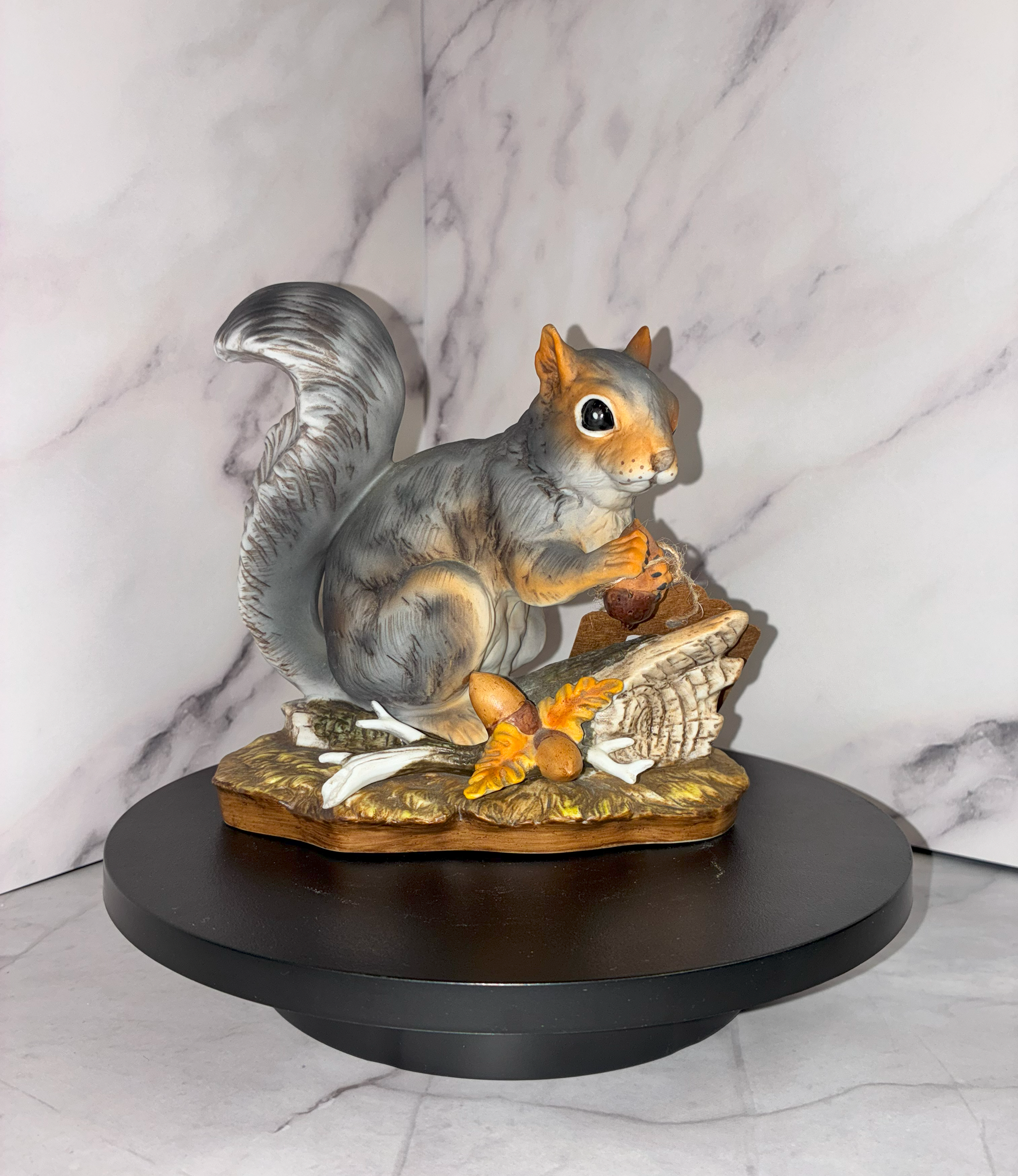 porcelain squirrel figurine with acorns