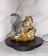 porcelain squirrel figurine with acorns