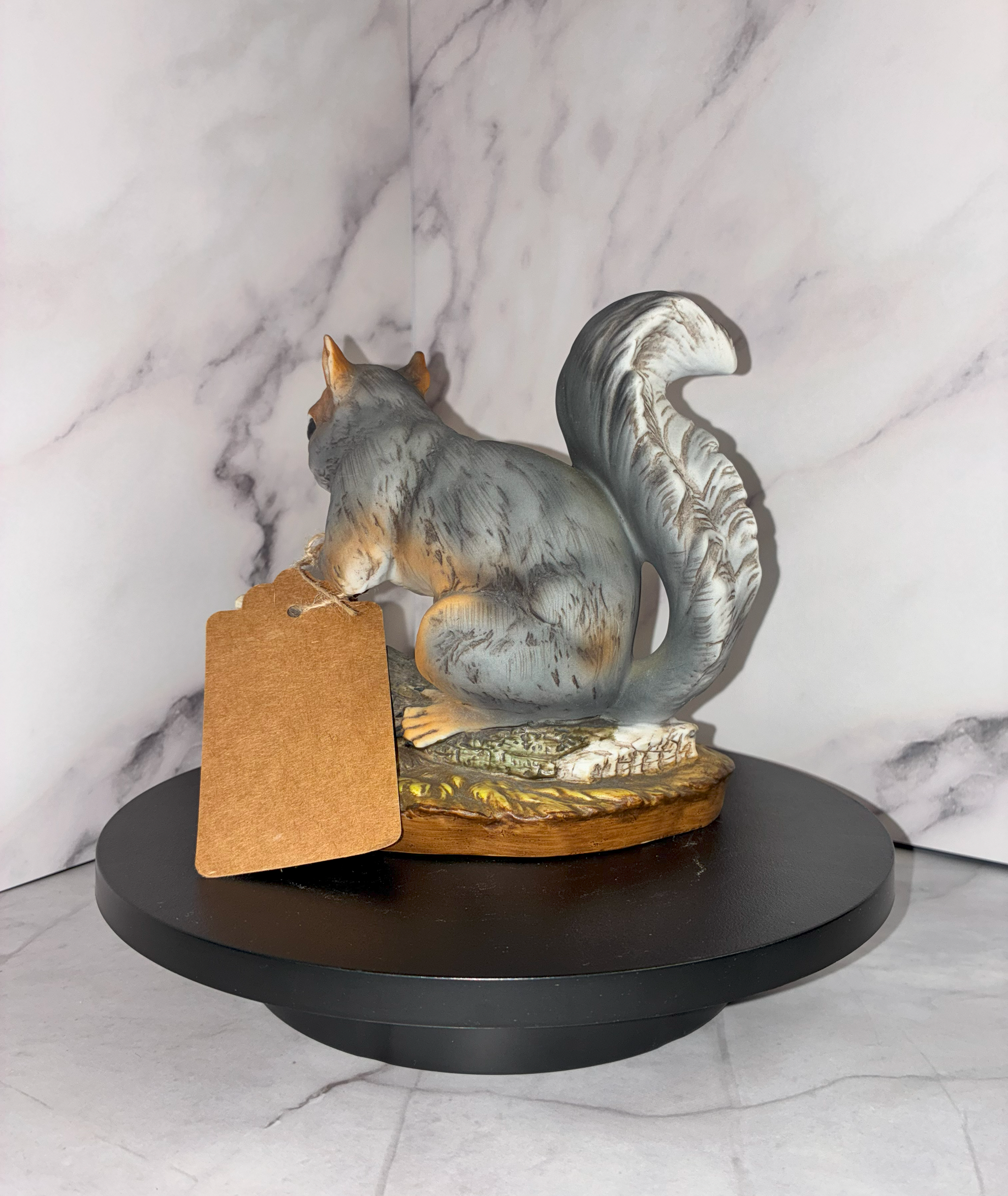 porcelain squirrel figurine with acorns