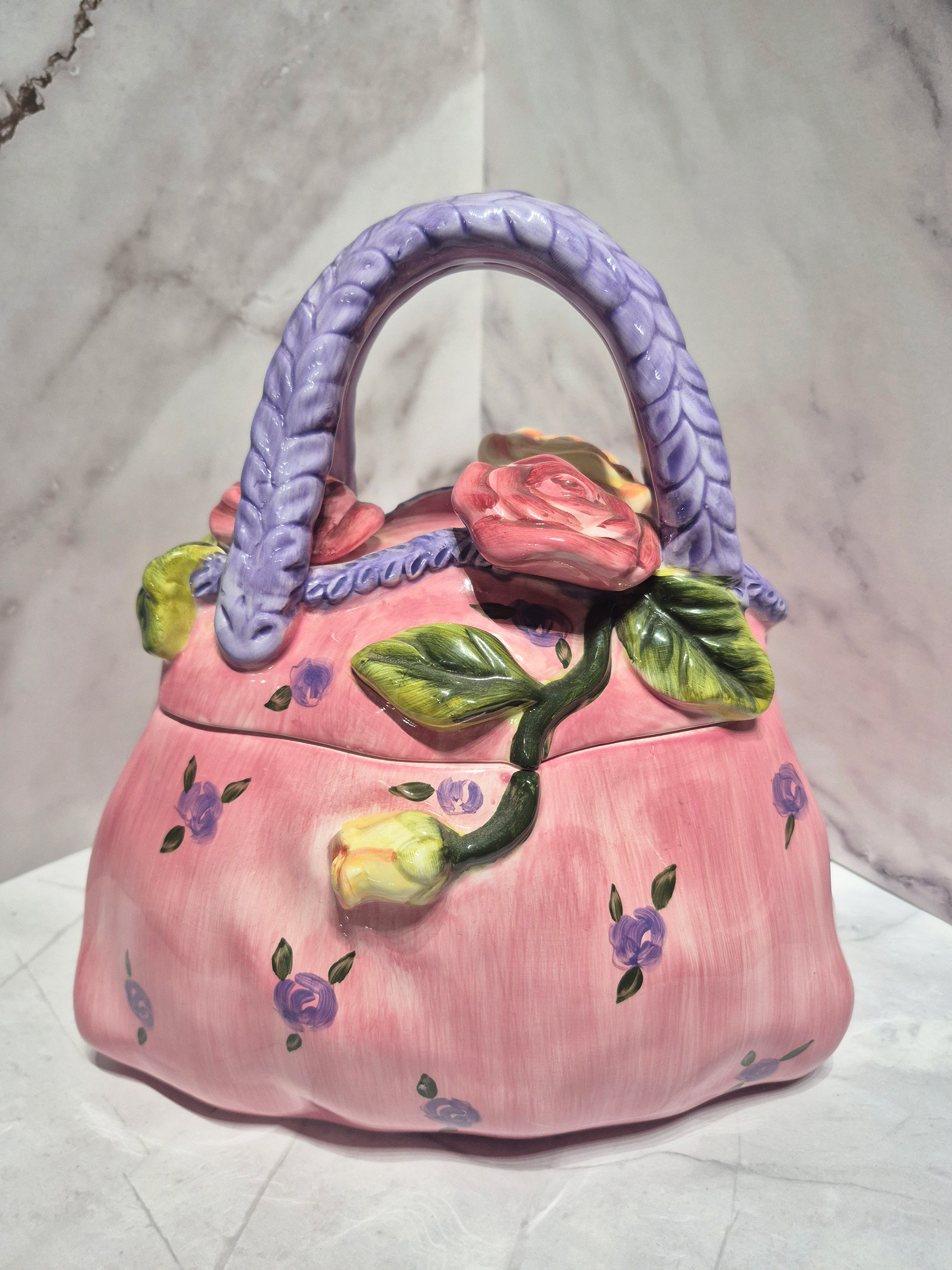 🌷 Victorian Purse Spring Handbag Ceramic Cookie Jar 🌷 crafted in pink with rose designs and braided lavender handles.